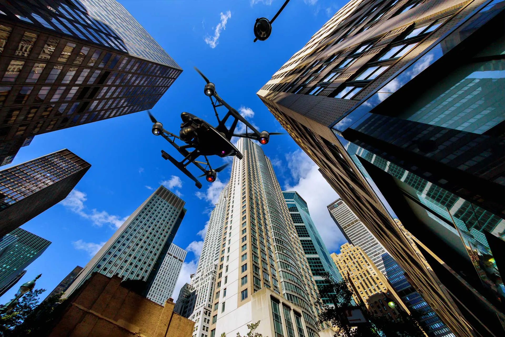 drone flying among skyscrapers cctv camera