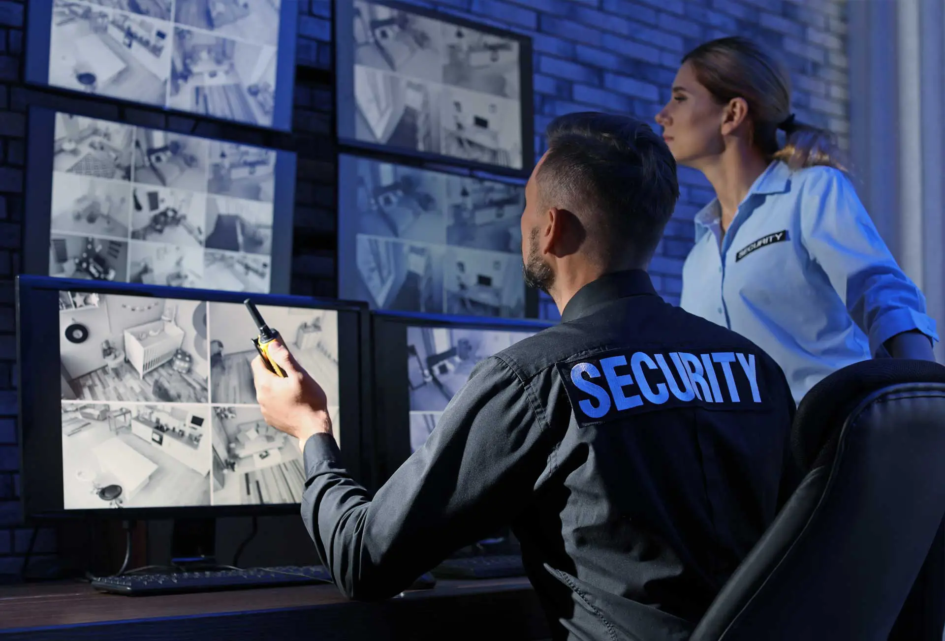 security guards monitoring cctv cameras